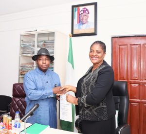 ESUABANA HANDS OVER TO EBIOGEH AS THE NEW FMIST PERMANENT SECRETARY.